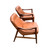 Side image of a pair of mid-century leather lounge chairs by Medellin Custom Furniture.