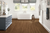 Armstrong Flooring - Rigid Core Vantage Summerfield Oak Sunset Glow 7" x 60" Waterproof Luxury Vinyl Plank Flooring with Cork Backing A6905 SQFT Price : 3.39