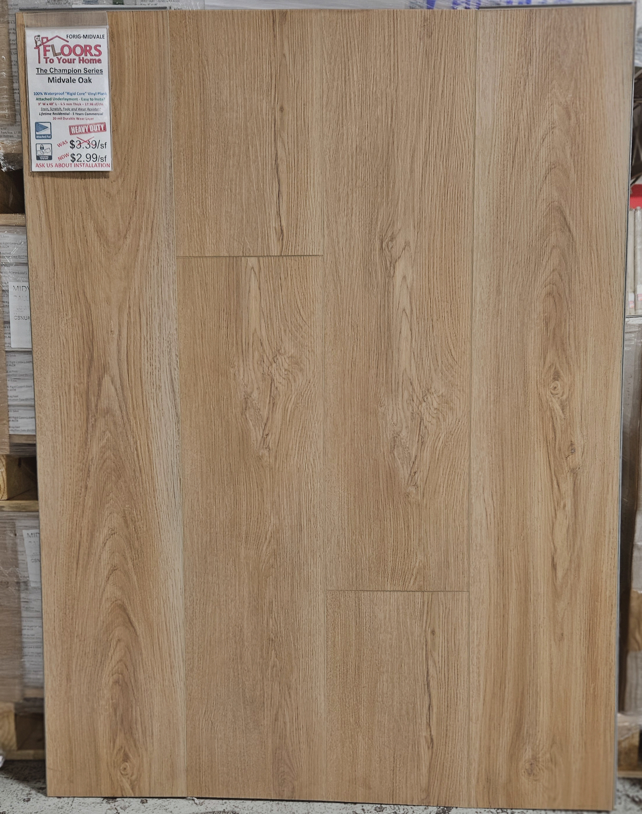 The Champion Series - Midvale Oak - Rigid Core - 9"x48" Waterproof Luxury Vinyl Plank Flooring with Attached Pad MIDVALE SQFT Price : 3.39 stand
