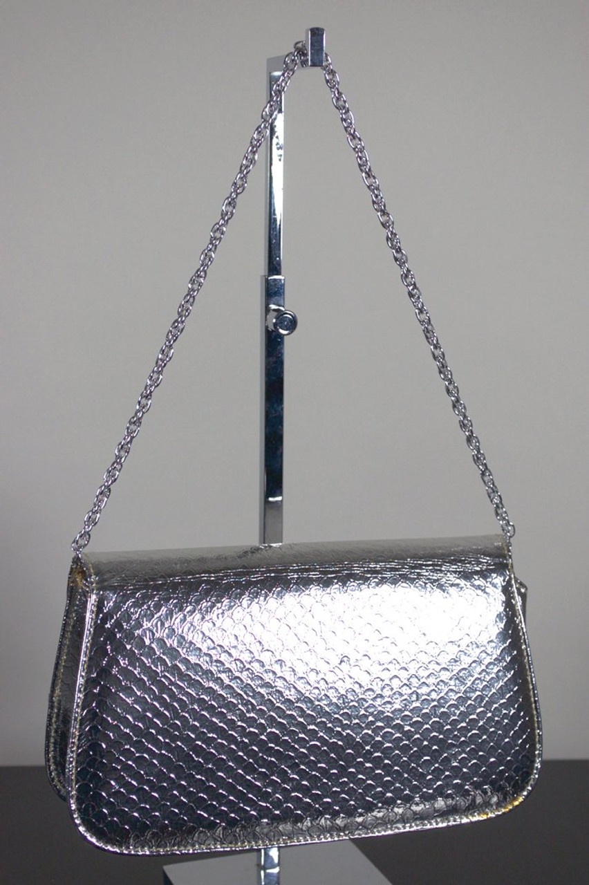 Metallic silver clutch bag with kiss lock closure and vintage kimono lining