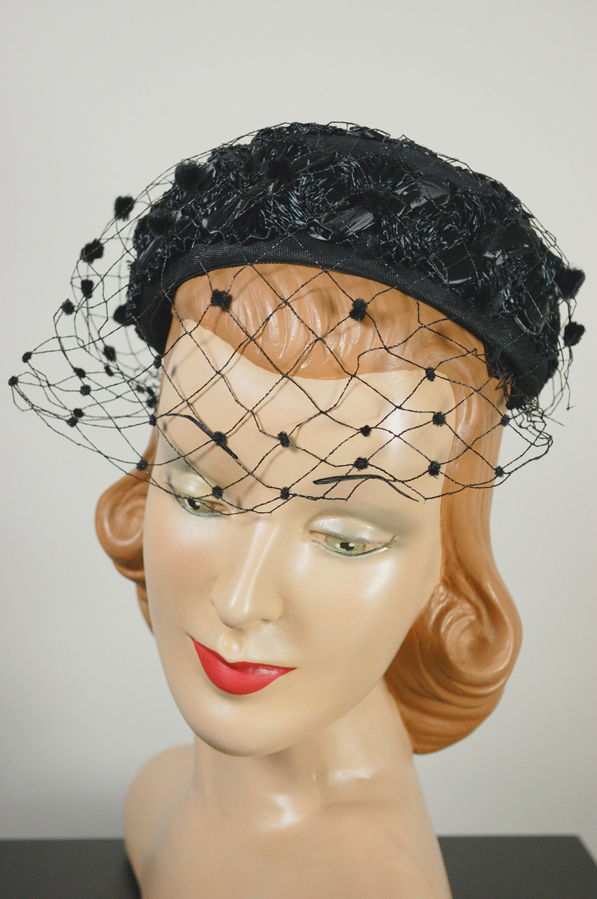 Black raffia straw 1960s mini pillbox hat with polka dotted veil