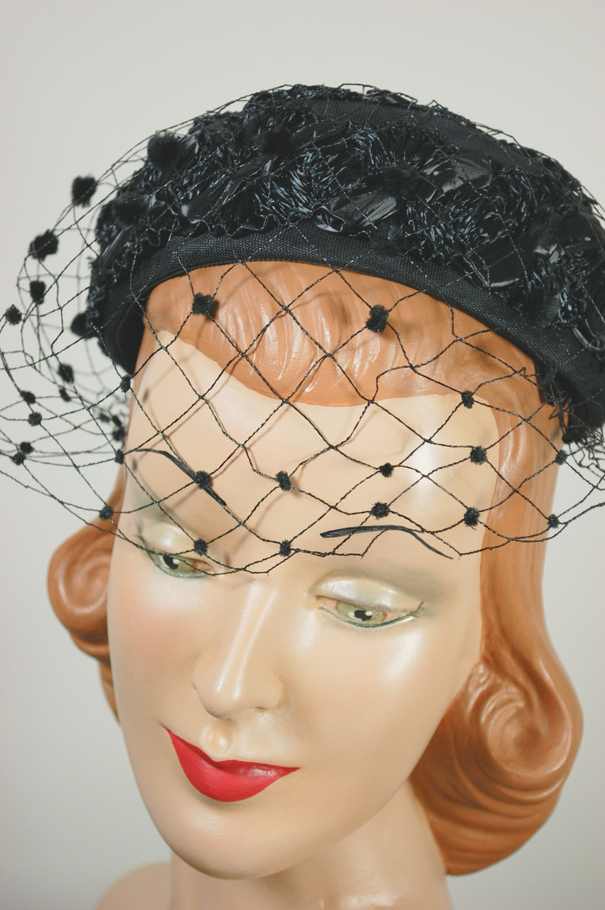 Black raffia straw 1960s mini pillbox hat with polka dotted veil