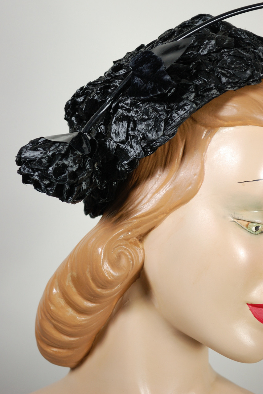Black straw early 1960s pillbox hat with patent vinyl rose flower trim