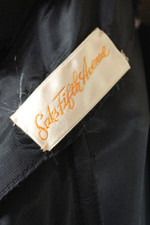 LBD early 1960s wiggle sheath dress XS bows trim black rayon 26 inch waist