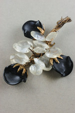 Surrealist spiky floral brooch bouquet 1930s pin Haskell style wired petals black glass clear lucite