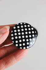 clip-on earrings totally 80s black white polka dots big button style
