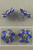 Sterling silver earrings 1940s blue rhinestone flowers screwback