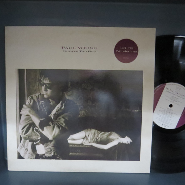 Paul Young-Between Two Fires-VINYL LP-USED-SHLP_5804