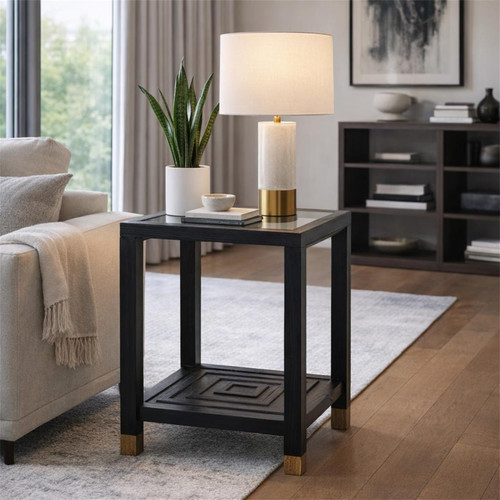 Lennox Black Side Table styled beside a sofa with a table lamp and plant
