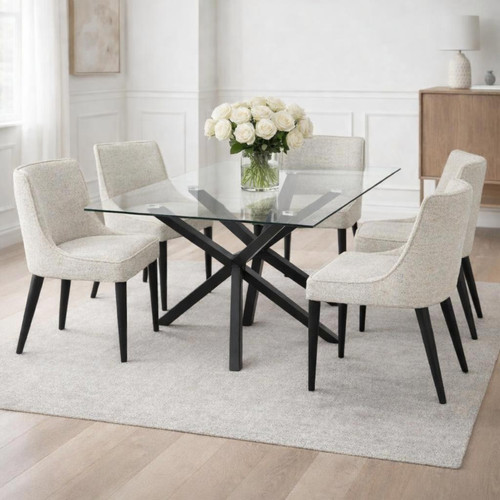 Monza Rectangular Glass Dining Table styled with upholstered dining chairs and a rose centrepiece