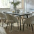 Sorelle Curved Dining Chairs styled around a dining table with vases and candles