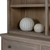 Close-up of decorative spheres styled on a shelf of the Delphine 3 Shelf Large Dresser Top
