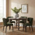 Darcy antique white vase as a centrepiece on a round dining table styled with green upholstered chairs