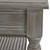 Close-up of the Serene Rattan Coffee Table's leg joinery and woven cane shelf