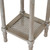 Close-up of the Serene Rattan Small Side Table's woven rattan lower shelf