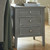 Serene 3 Drawer Bedside Table styled in a bedroom setting beside an armchair with throws