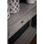 Close-up of the Serene 2 Drawer Console Table's drawer front styled with lanterns and a vase