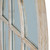 Close-up of the Washed Wood Arched Window Mirror's arched glazing bar detailing