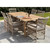 Provence Outdoor Dining Chairs styled around a wooden dining table in a garden setting