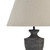 Close-up of the Incia urn wooden table lamp showing the grey-washed wood grain beneath the shade