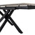 Underside view of the Romanby Stone Extending Dining Table, showing the black metal frame, criss-cross legs, and fixing bolts securing the stone top.