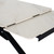 Close-up of the Romanby Stone Extending Dining Table with the leaf partially separated, revealing the black metal extension rail beneath.