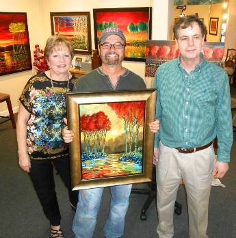 Suzy, Ford and Rick Mullen gallery owner