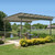 A tranquil outdoor space featuring an aluminum pergola, offering sleek design and shade.