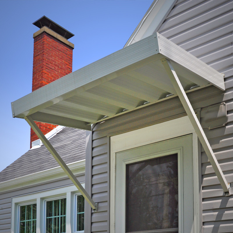 Sleek white aluminum door awning, ideal for enhancing curb appeal and weather protection.