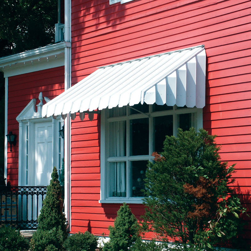 Vintage-style aluminum awning providing shade for a window, featuring a classic design reminiscent of mid-20th century architecture.