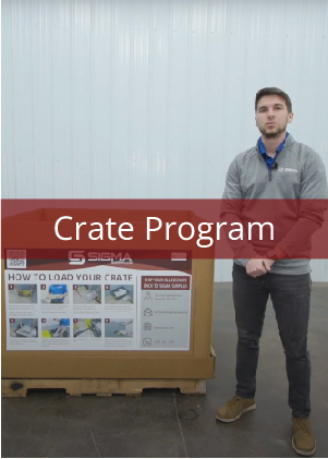 A SIGMA Surplus employee showing off a branded crate.