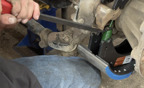 PG338 - BRAKE SPRING FORK TO REMOVE & REPLACE THE S-CAM RETURN SPRING