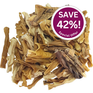 A large pile of assorted natural pieces of lamb skin air-dried, forming curled tasty dog chews. The chews are assorted shades of brown, mostly a buttery-beige and honey tones but some quite dark - they vary as a natural product.  The top right has a purple circle containing white text 'Save 42%! Special offer'.