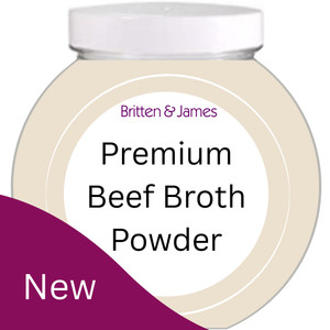 Cartoon image of a jar of Britten & James Premium Beef Broth Powder. To the bottom left is a purple shape with white text saying 'New'
