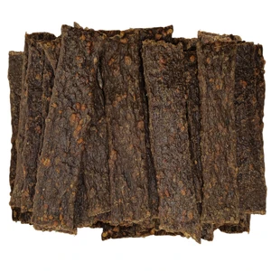 Dark brown, textured 100% beef strips photographed on a white background.