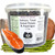 A tub of Britten and James complete grain-free dog food with ingredients around it; Salmon, Trout, Sweet Potato and Asparagus.