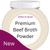 Cartoon image of a jar of Britten & James Premium Beef Broth Powder. To the bottom left is a purple shape with white text saying 'New'