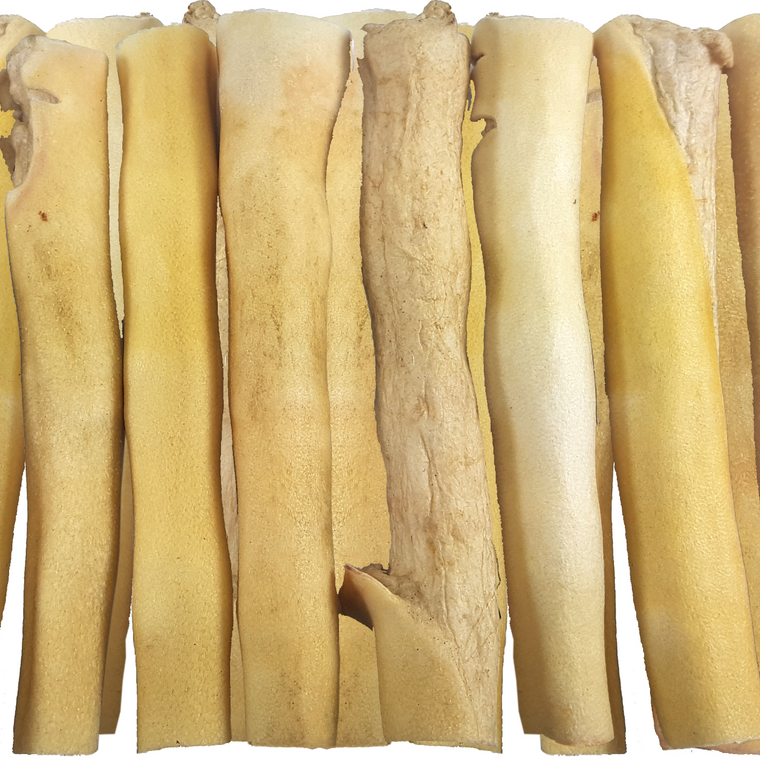 10 thick cow tails. Light buttery-brown in colour, with no fur.