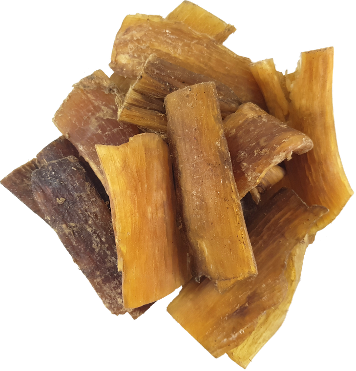 A  pile of paddy wack strips (light brown natural dog treats)
