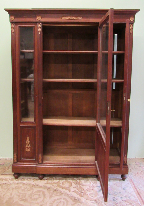 Mid 19th Century French Empire Red Mahogany Three Glass Door Bookcase With Three Adjustable Shelves