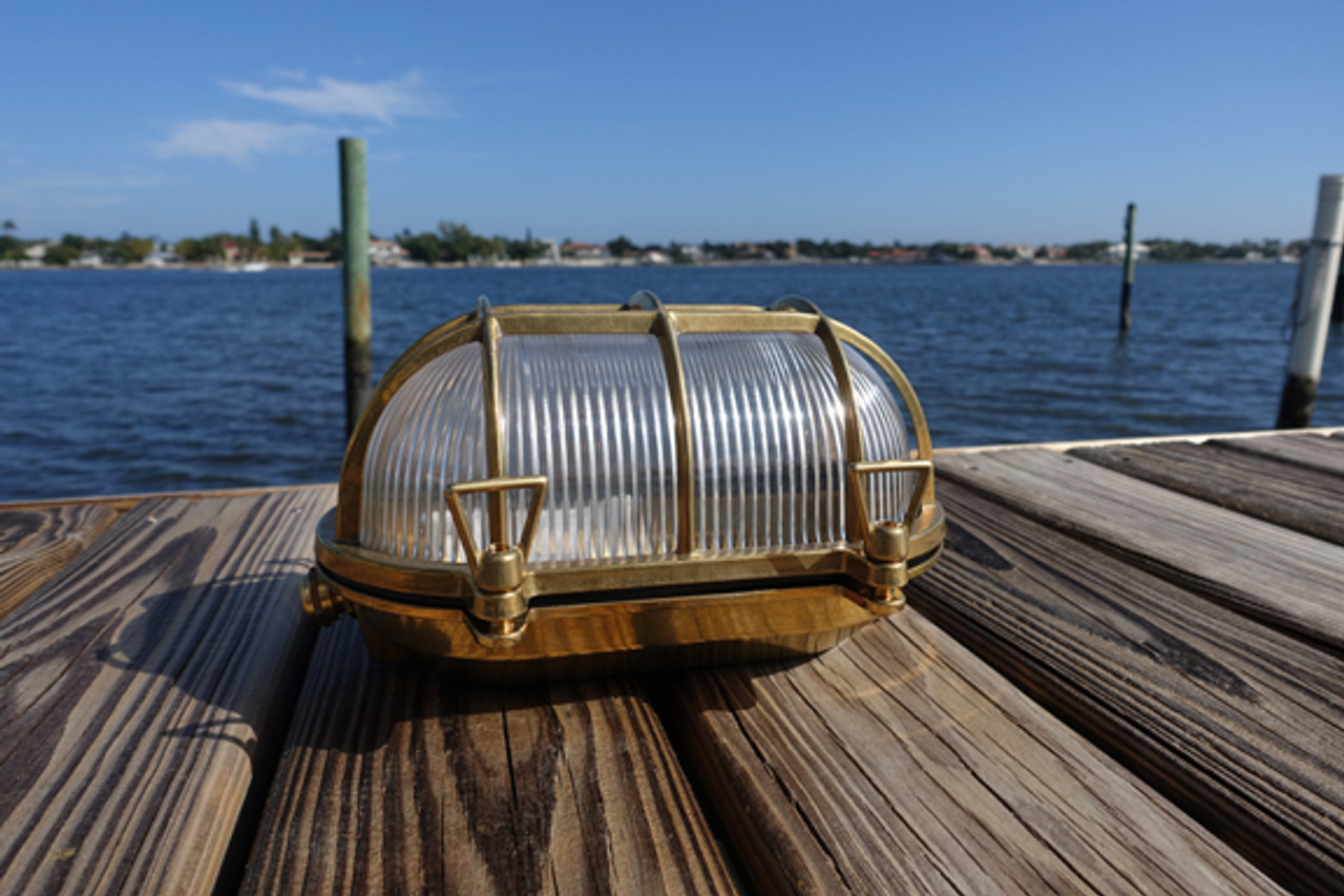 large brass oval nautical light