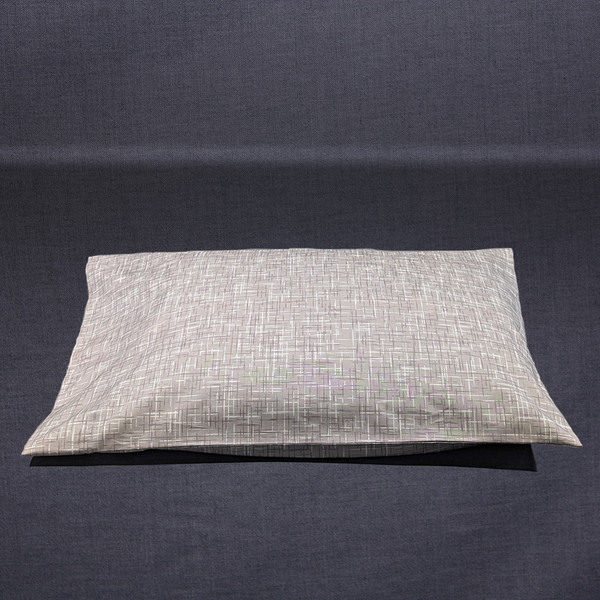 Outer pillow case shown with a pillow inside