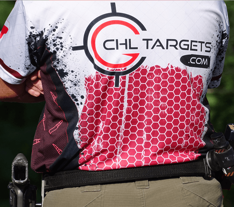 A competitive shooter wearing a CHL Targets shirt