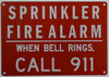 SPRINKLER FIRE ALARM WHEN BELL RINGS CALL 911  BUILDING SIGNAGE