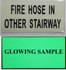 FIRE HOSE IN OTHER STAIRWAY  - PHOTOLUMINESCENT GLOW IN THE DARK   Compliance sign