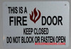 THIS IS A FIRE DOOR KEEP CLOSED DO NOT BLOCK OR FASTEN OPEN  BUILDING SIGNAGE