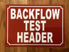 BACKFLOW TEST HEADER SAFETY SIGN