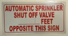 AUTOMATIC SPRINKLER SHUT OFF VALVE_FEET OPPOSITE THIS   BUILDING SIGNAGE