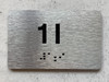 APT# 1I Ada Sign