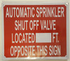 AUTOMATIC SPRINKLER SHUT OFF VALVE LOCATED_FEET OPPOSITE THIS    BUILDING SIGN